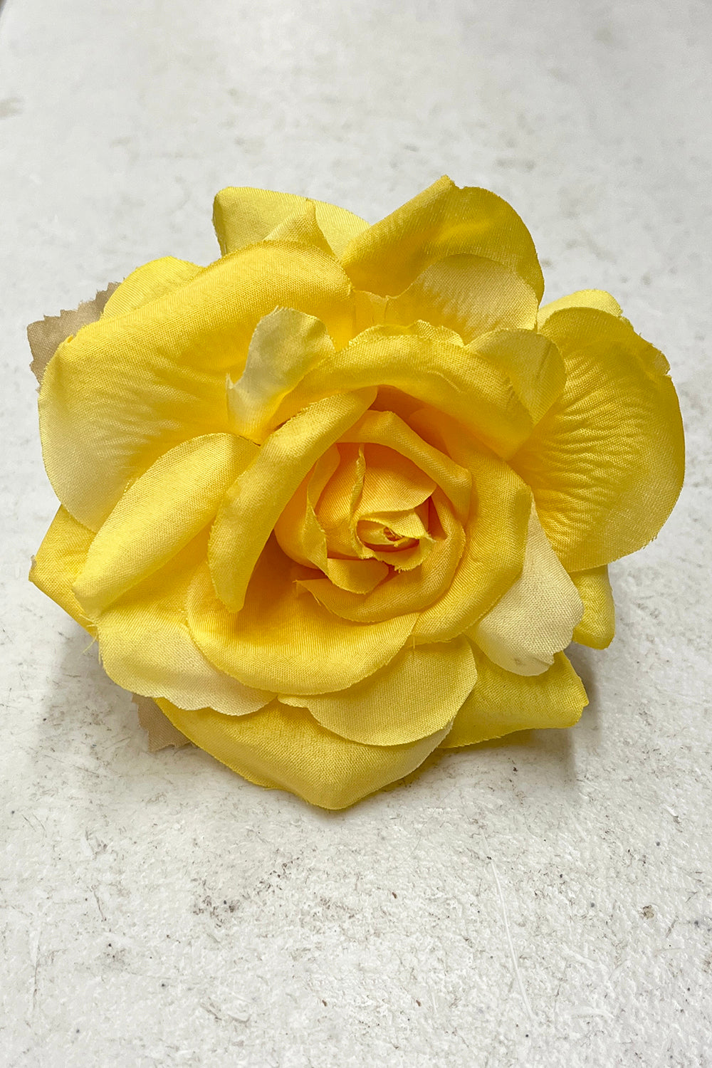 Kid's Dream fabric faux flowers in yellow, available as single pieces or packs, perfect for accessories or craft projects.