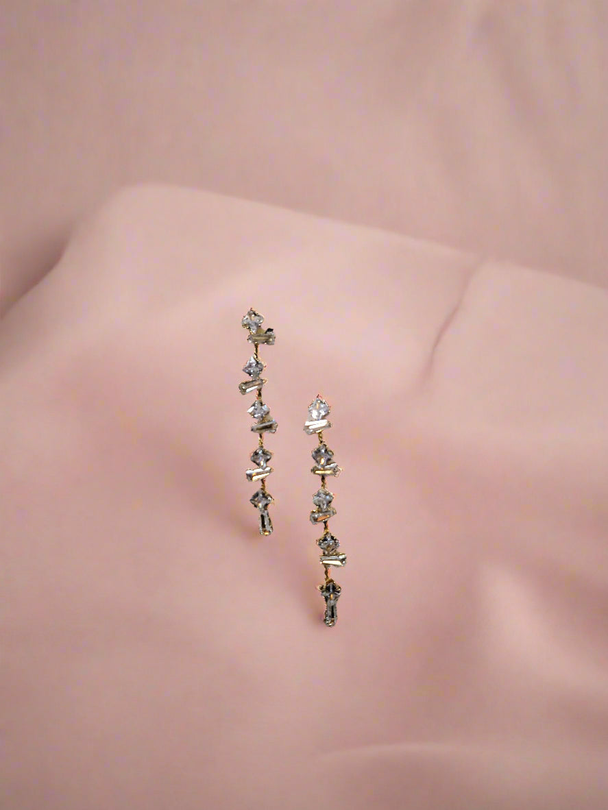 Calla Collection earrings TR-11347 displayed on a white background, showcasing elegant, silver jewelry with intricate design details.