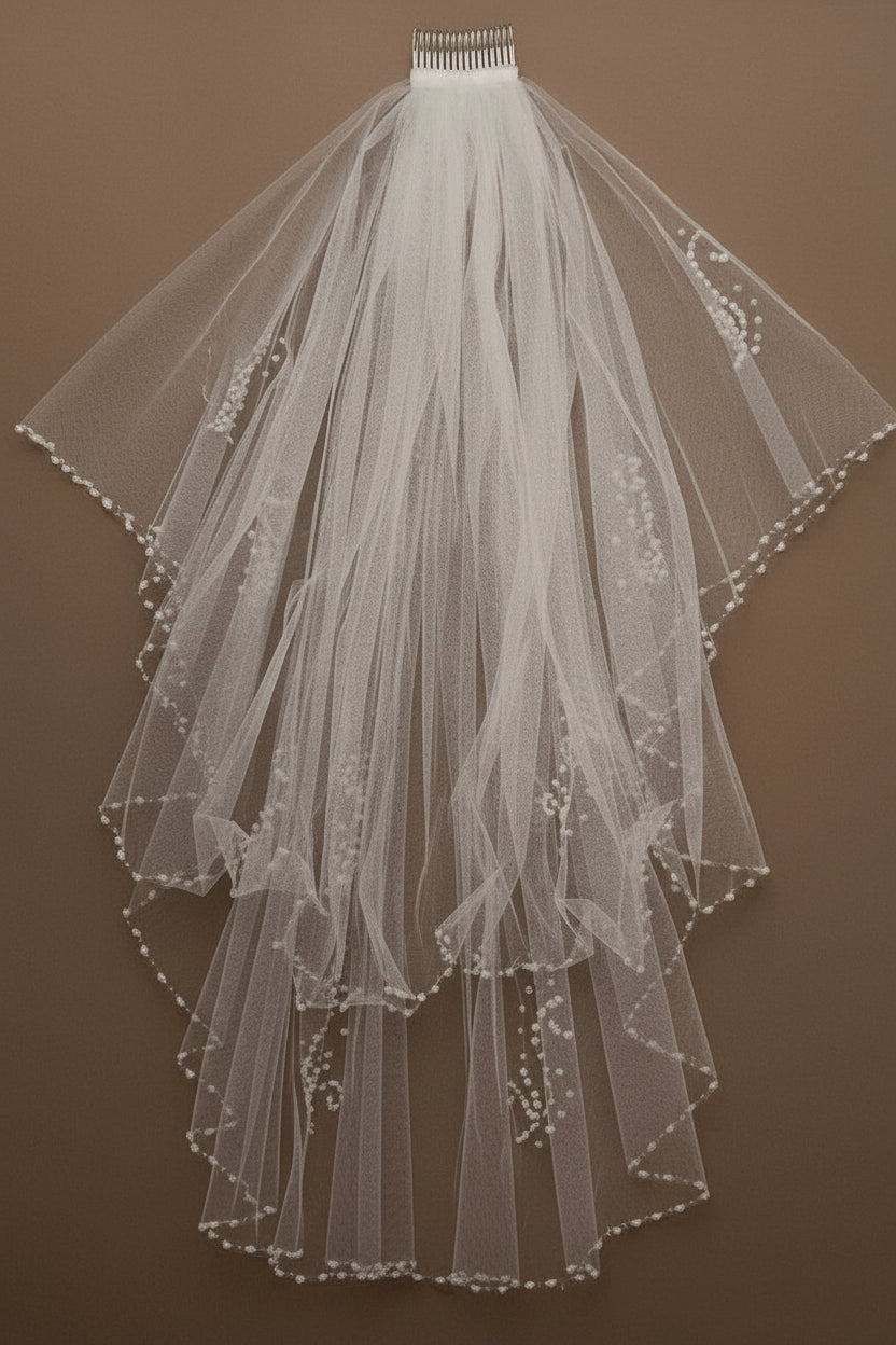 Elegant Calla Collection WV-320 bridal accessories featuring intricate lace and pearl embellishments, perfect for wedding attire.