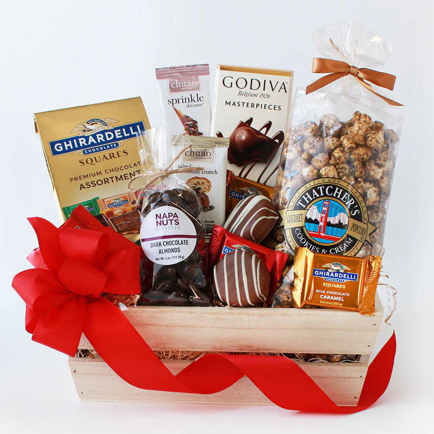 Chocolate Dreams gift basket by GreatArrivals features assorted chocolates and treats in a decorative crate.