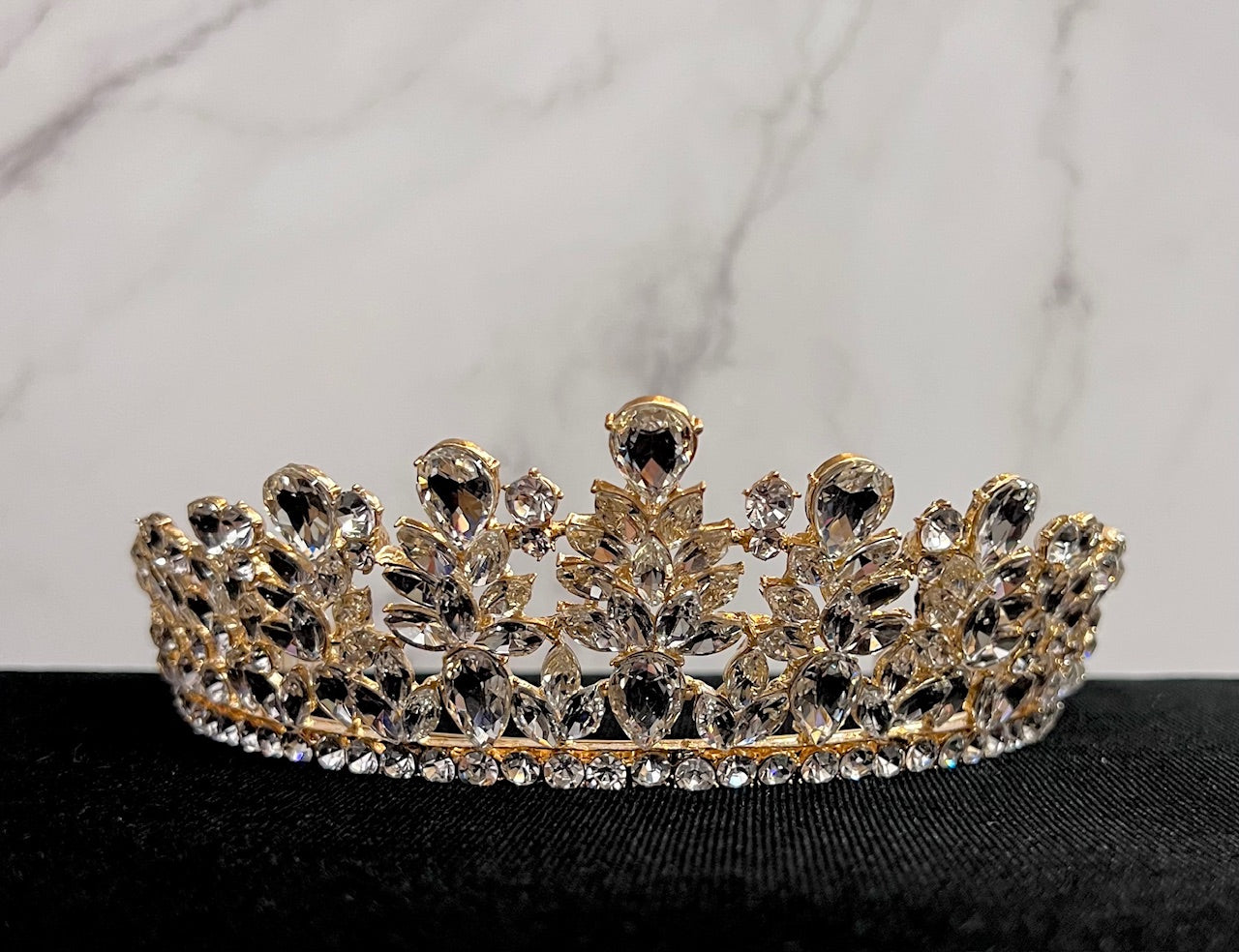 Gold jewelry piece from Calla Collection, TR-41212, featuring intricate design and shiny gold finish.