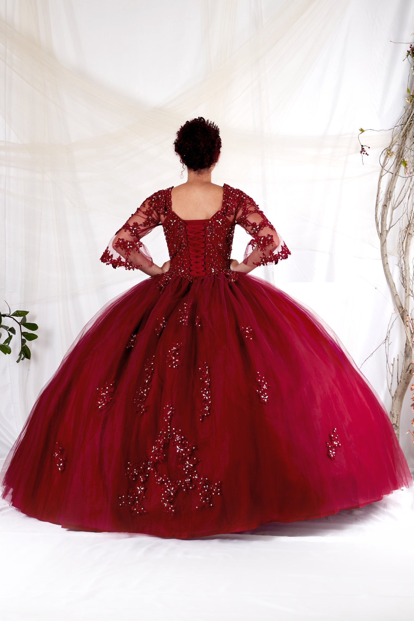 Elegant sweeping floor-length hemline and premium factory edge stitching defining the luxurious silhouette of Calla Collection KY-70029