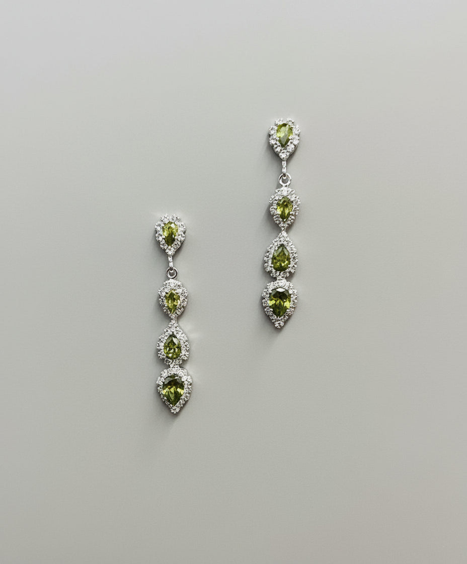 Calla Collection earrings with sage green gemstone and gold-tone accents, showcasing elegant dangle jewelry.