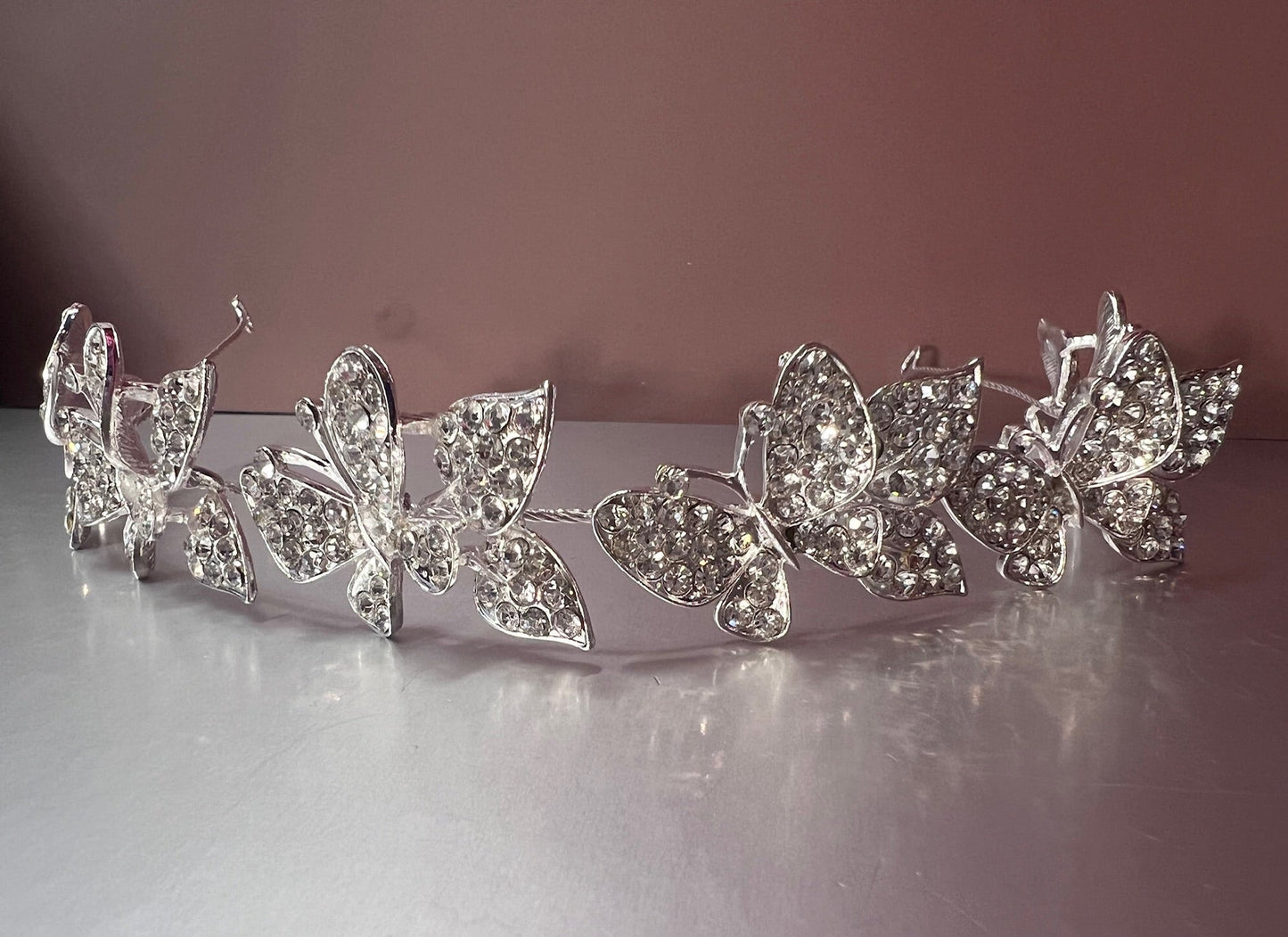 Silver jewelry piece from Calla Collection, model TR-633, featuring intricate design and polished silver finish.