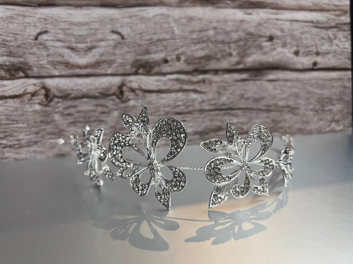 Silver jewelry piece from Calla Collection's TR-630 collection, featuring intricate design and polished finish.