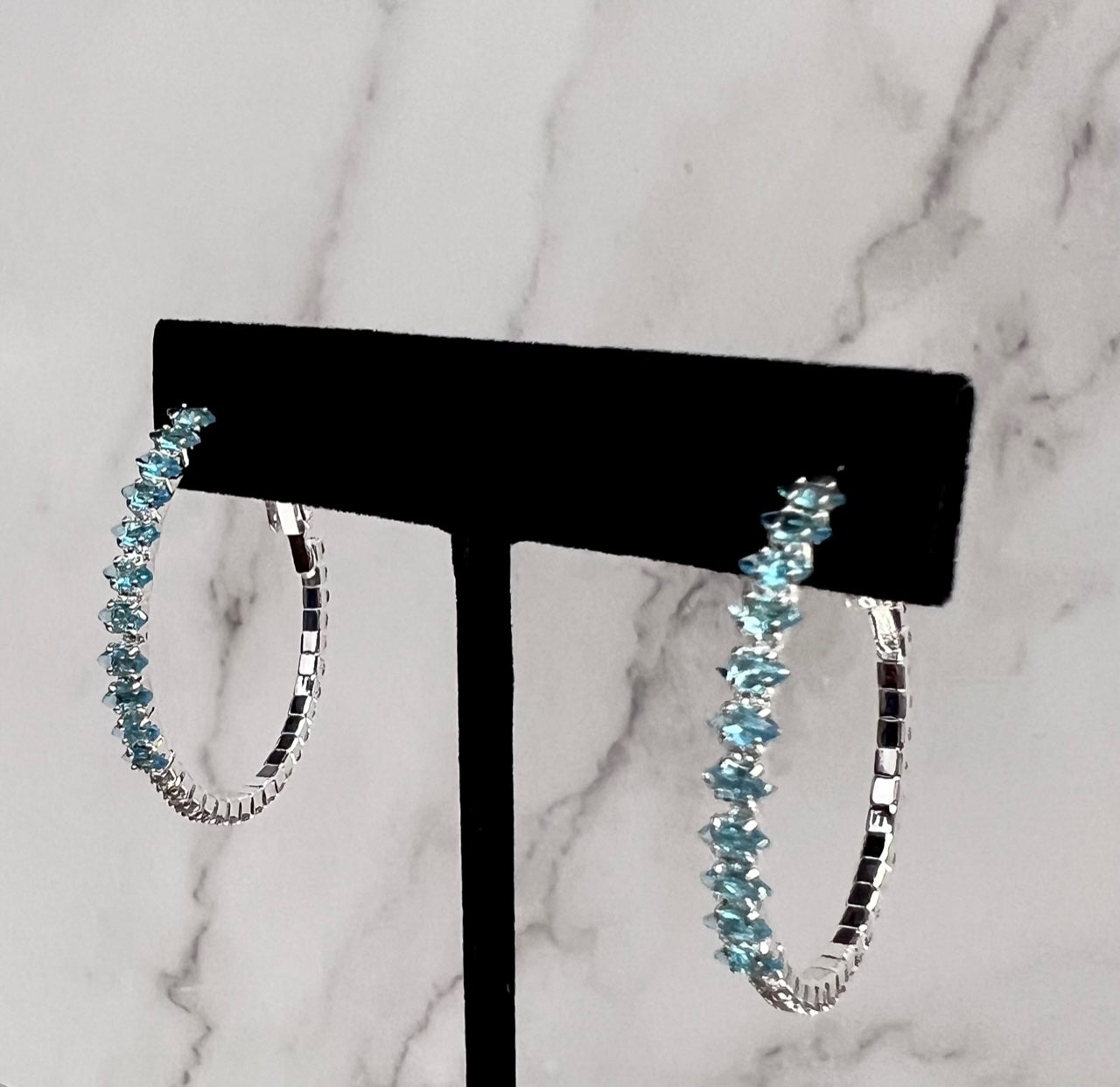 Delicate turquoise Calla Collection earrings with small hook design, elegant and stylish for everyday wear.