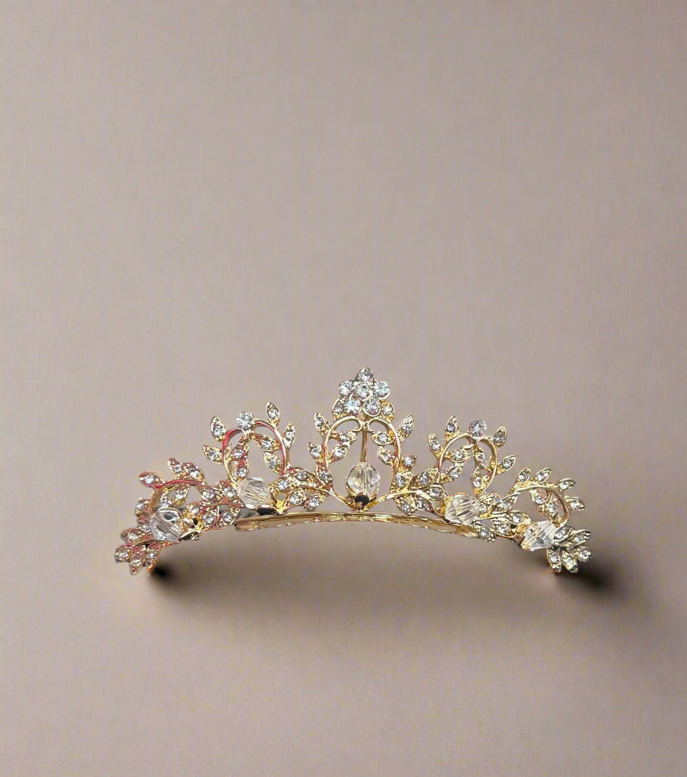 Gold Calla Collection TR-512 jewelry piece with intricate design, showcasing elegant craftsmanship and shiny gold finish.