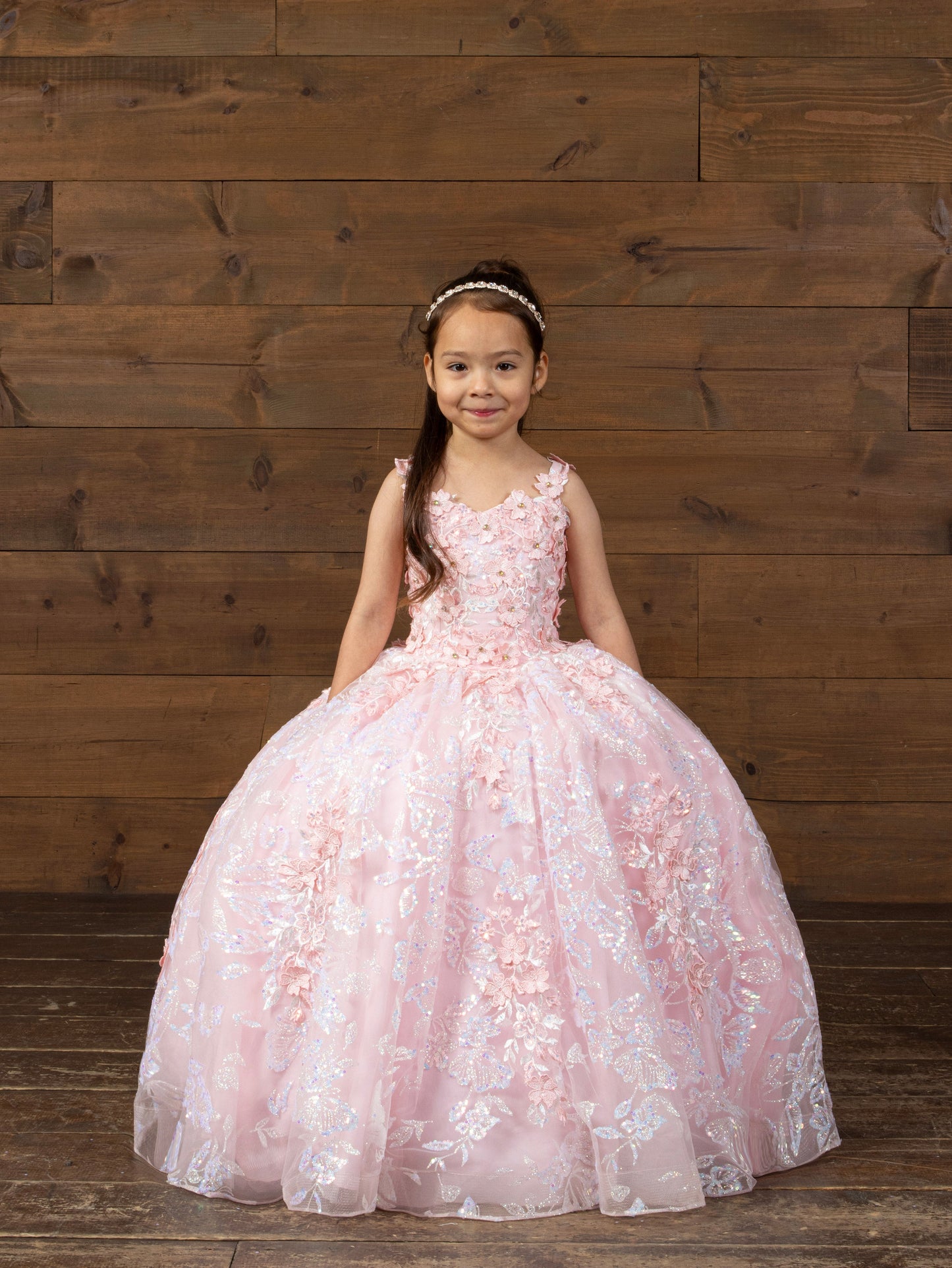 Calla Collection SCK-323 girls special occasion dress showcasing a structured sleeveless neckline and a premium tailored bodice frame.