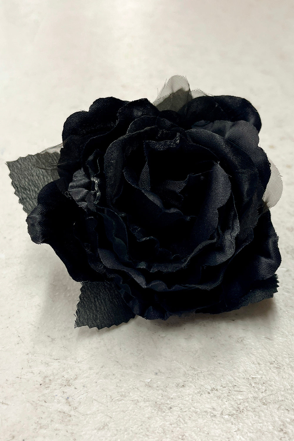 Black fabric faux flower accessories by Kid's Dream, variety of single or pack floral decorative pieces