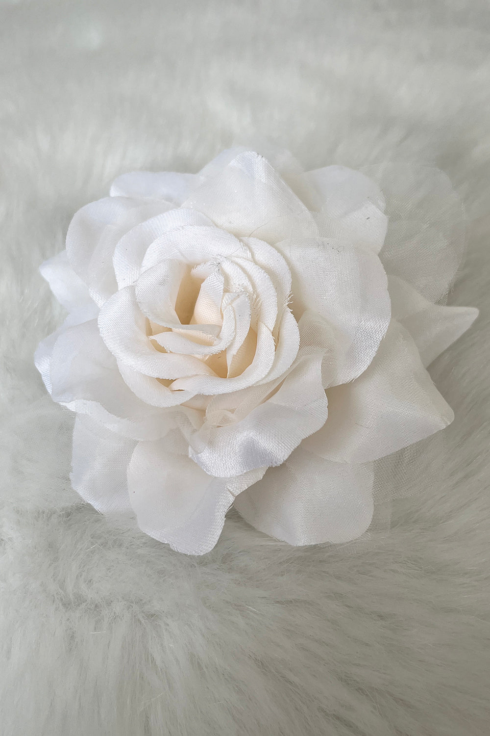 Ivory fabric faux flowers in various styles, perfect as accessories from Kid's Dream, shown in single and pack options.