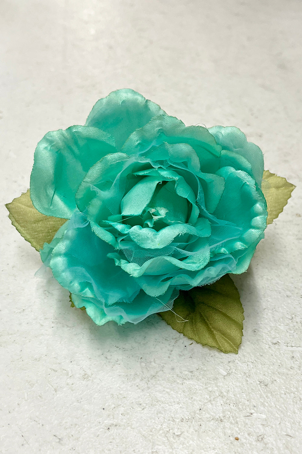 Assorted fabric faux flowers in mint green, pink, and yellow, suitable for accessories, from Kid's Dream.