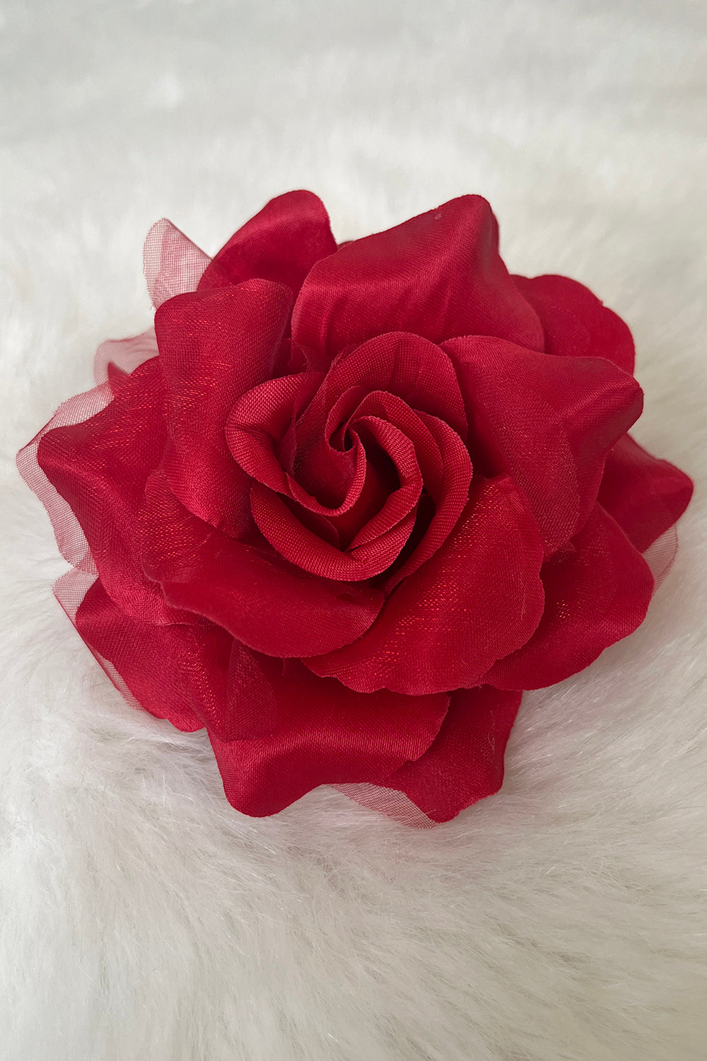 Colorful fabric faux flowers accessories by Kid's Dream, including single and pack options, with vibrant red flowers on display.