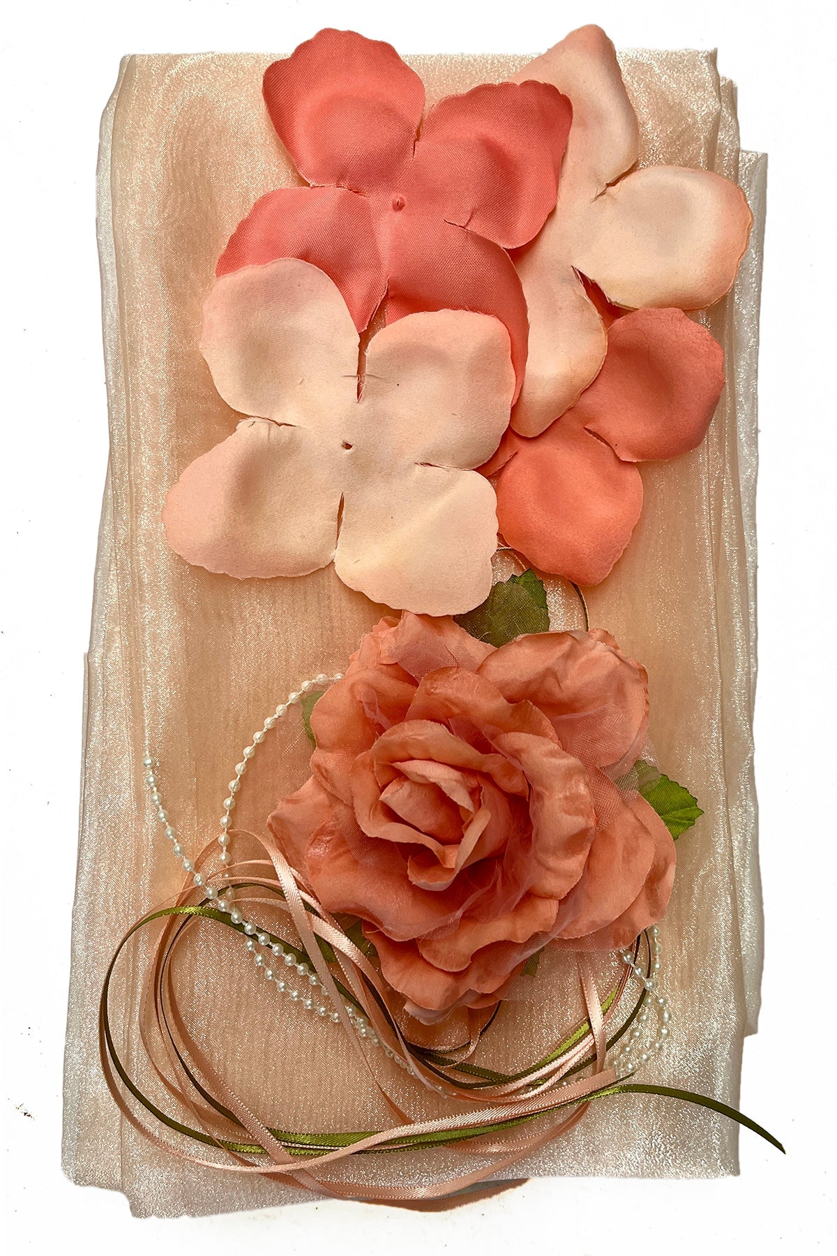 White satin flower petal baby dress with organza sash from Kid's Dream, featuring delicate floral details and a soft, elegant design.