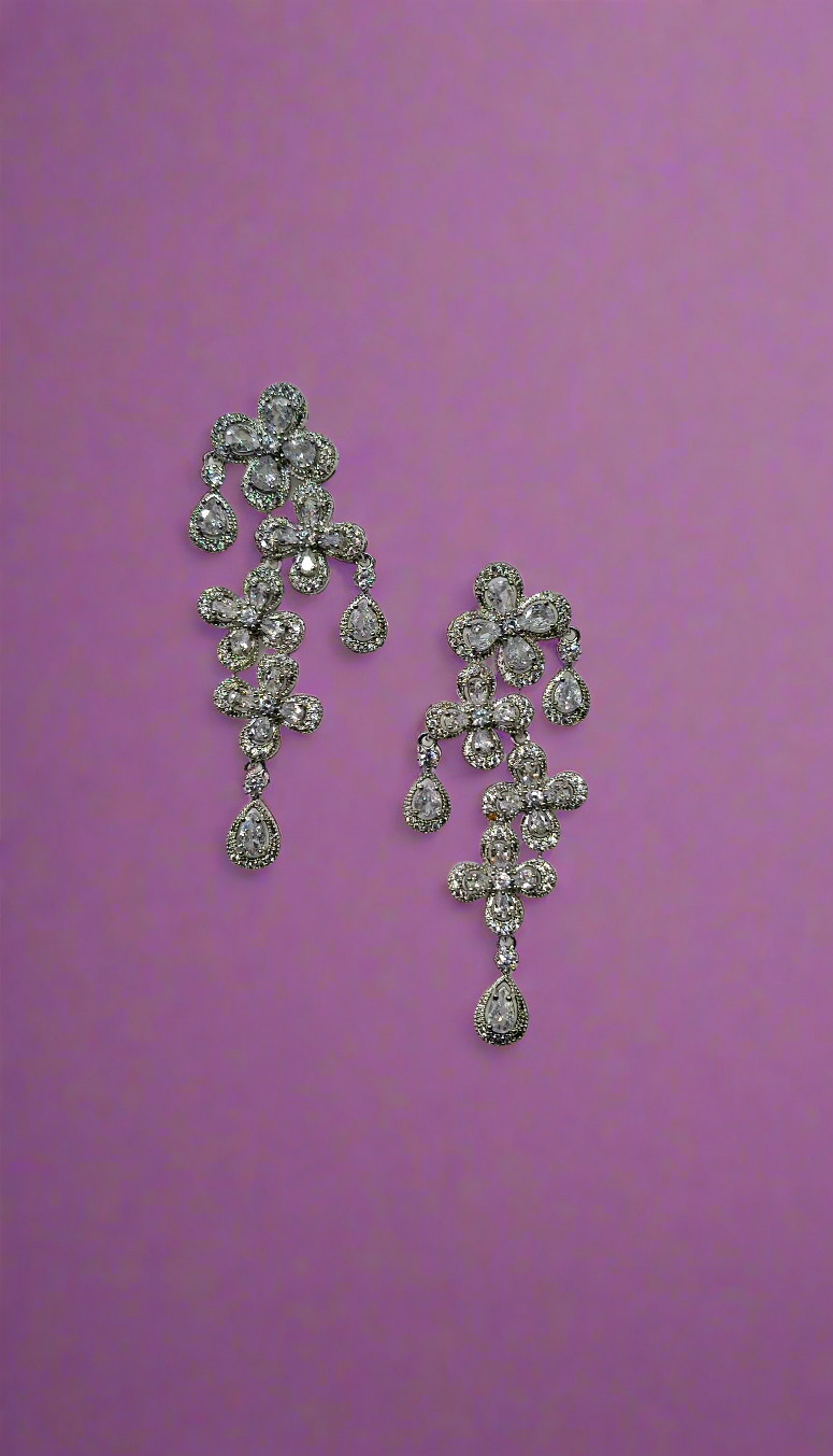 Calla Collection TR-11051 earrings featuring elegant silver hoop design with intricate detailing and gemstone accents.
