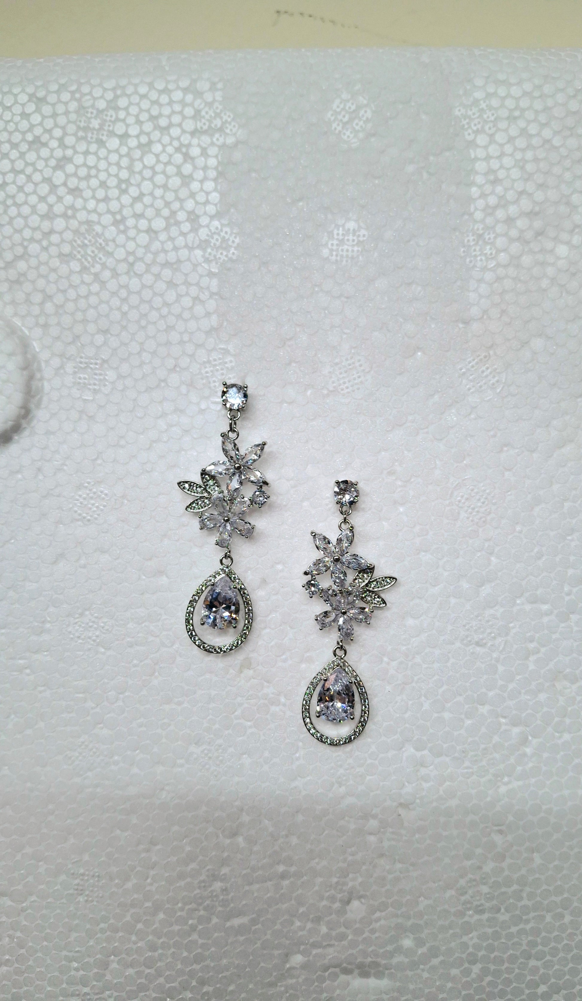 Calla Collection earrings TR-10658, stylish jewelry with intricate design, featuring elegant metalwork and gemstone accents.