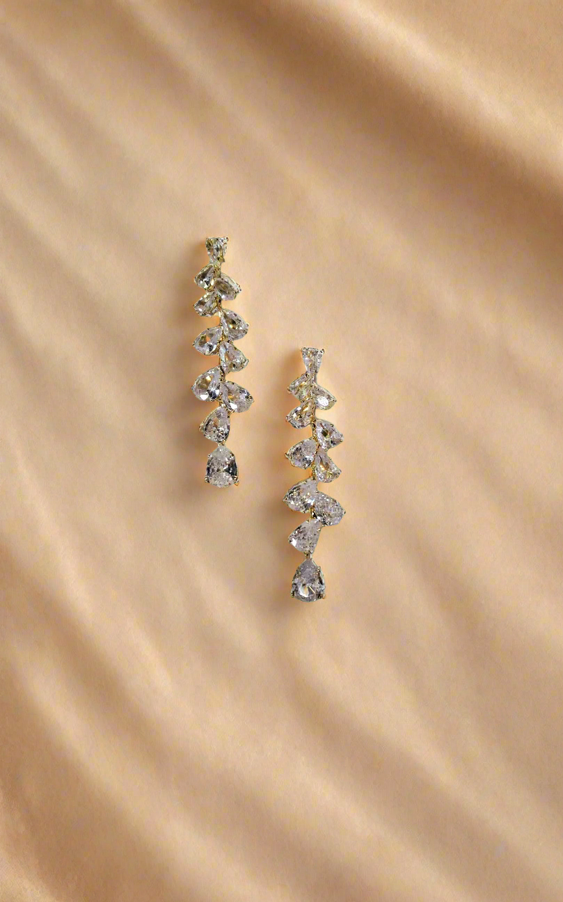 Calla Collection TR-11348 earrings featuring elegant silver hoops with intricate floral designs.