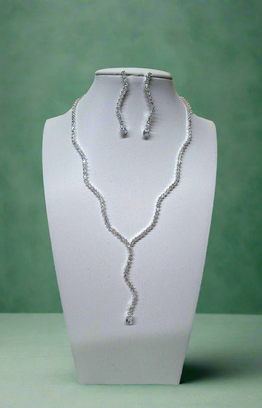 Elegant CALLAcollection necklace set featuring intricate design with beads and pendants, displayed on a neutral background.