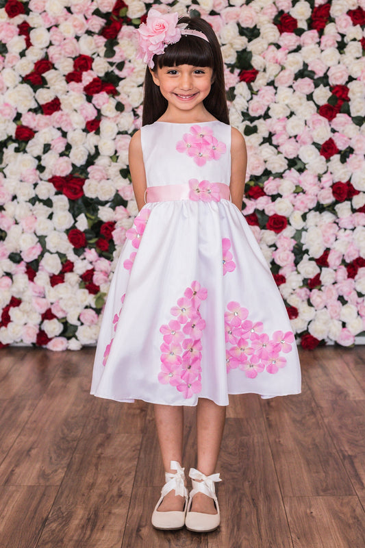 Pink Shantung girls' dress with flower petal decorations by Kid's Dream, showcasing a floral design and elegant fabric details.