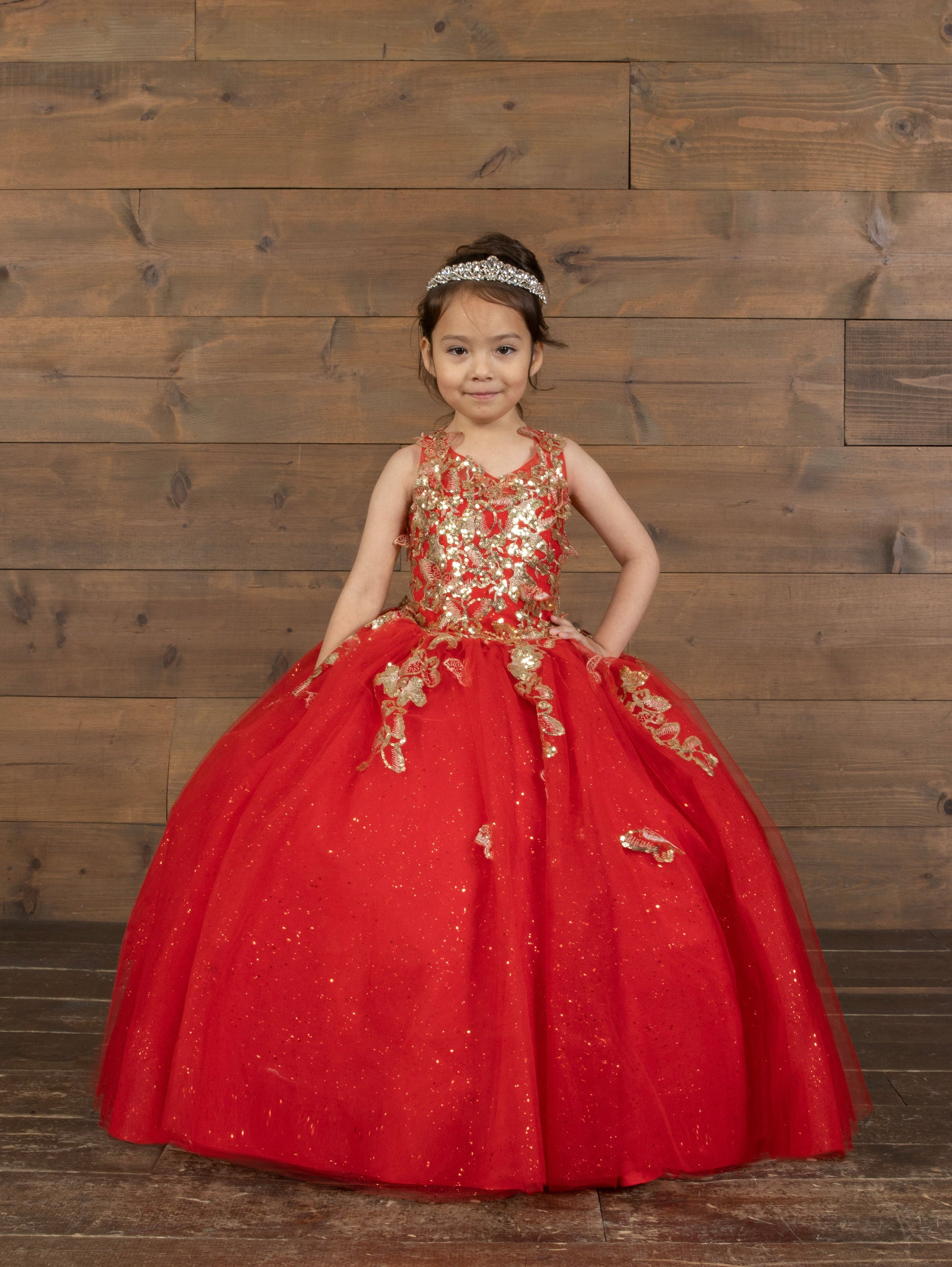 Calla Collection SCK-321 girls special occasion dress showcasing an elegant off-shoulder neckline design and a structured bodice frame.