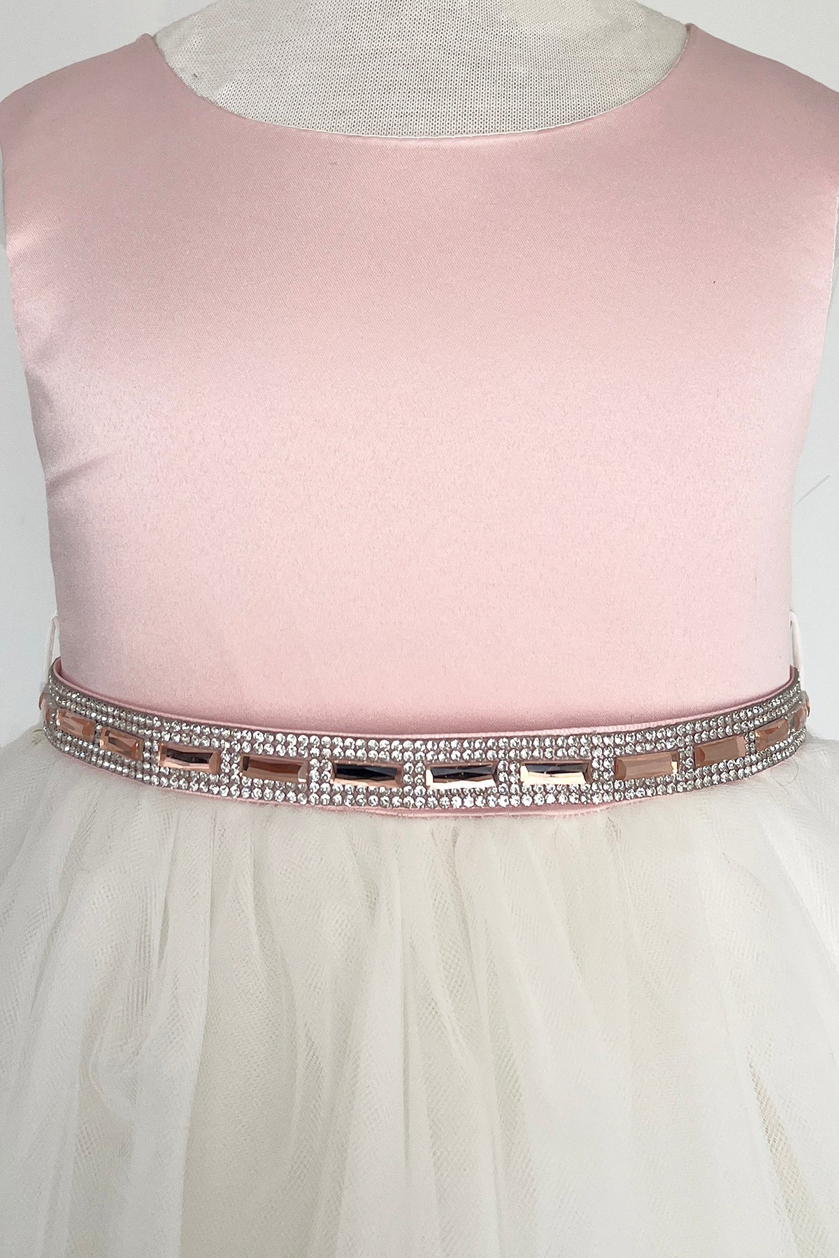Pink and rose gold rhinestone satin and tulle girls' dress by Kid's Dream, featuring elegant floral details and a layered skirt.