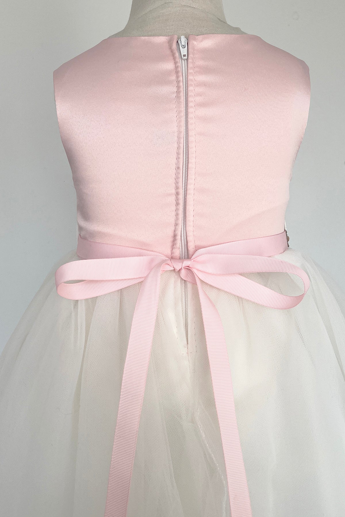 Pink and rose gold rhinestone satin and tulle dress for girls by Kid's Dream, elegant and suitable for special occasions.