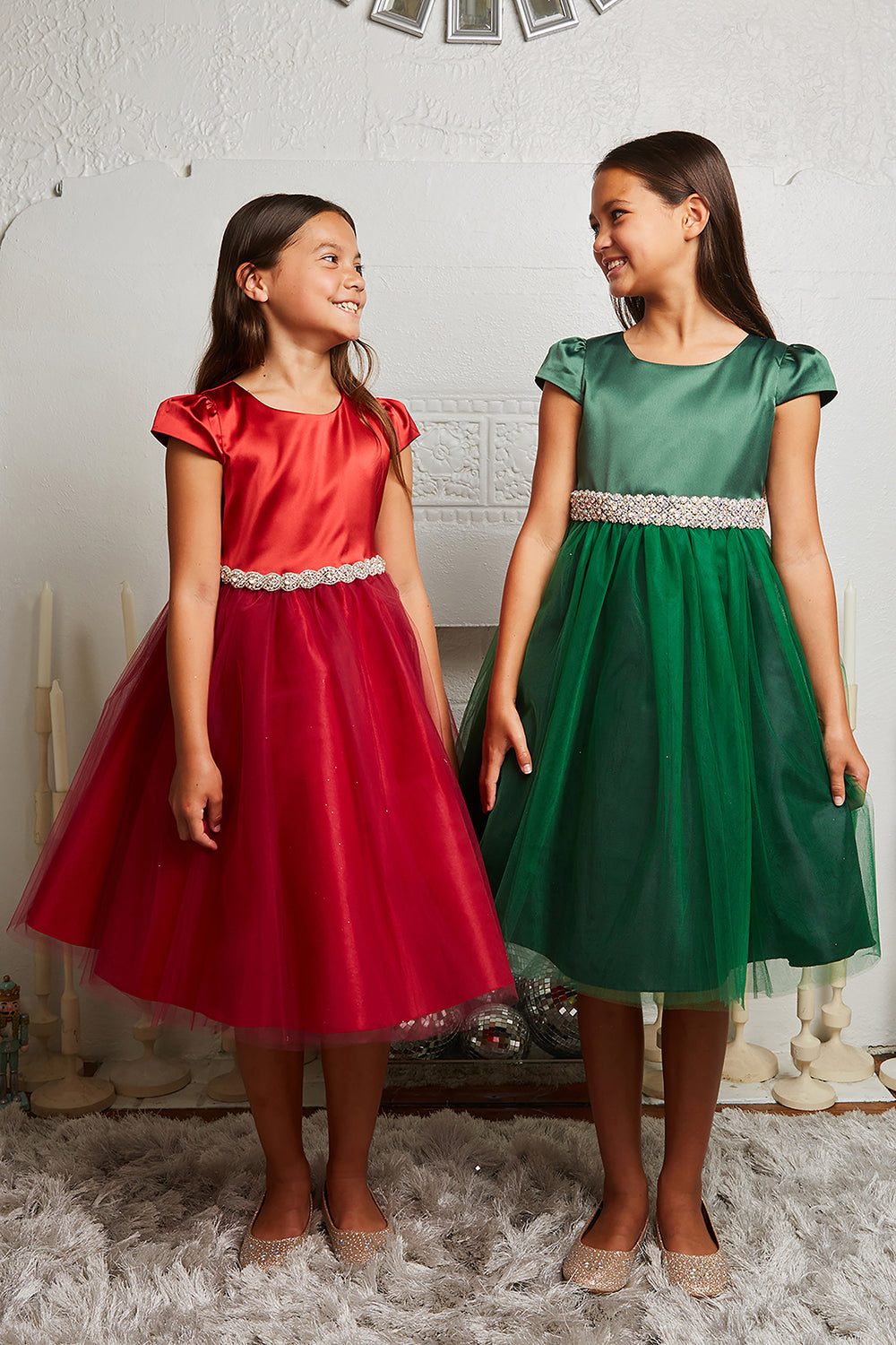 Kid's Dream plus size dress with capped satin sleeves, tulle overlay, and braided rhinestone trim in red and hunter green.