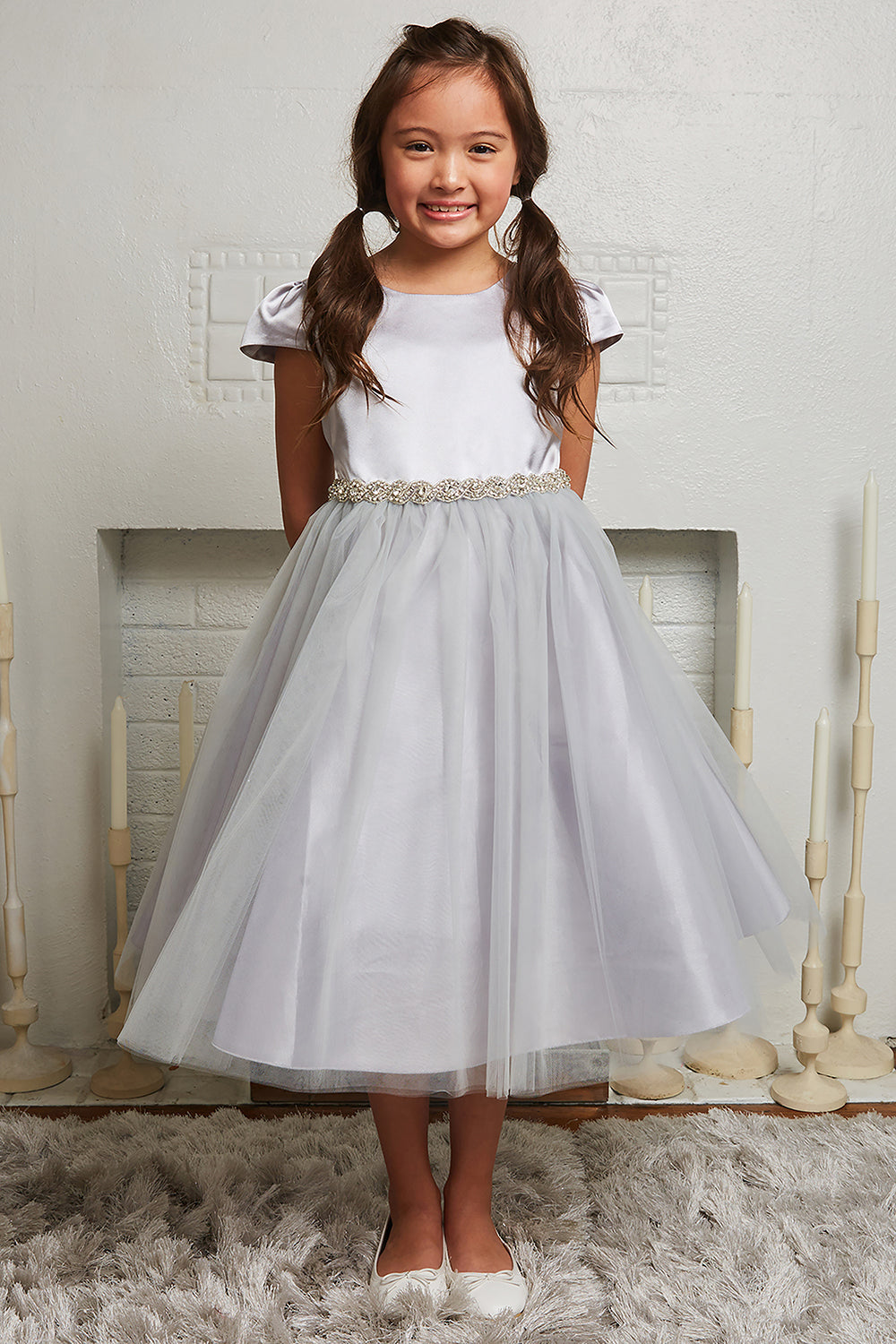 Silver plus size satin and tulle dress with capped sleeves and braided rhinestone trim from Kid's Dream.