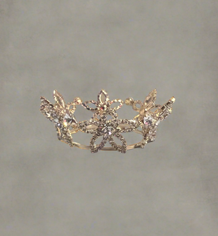 Small flower crown from Calla Collection, featuring delicate floral design and intricate details, perfect for jewelry or accessories.