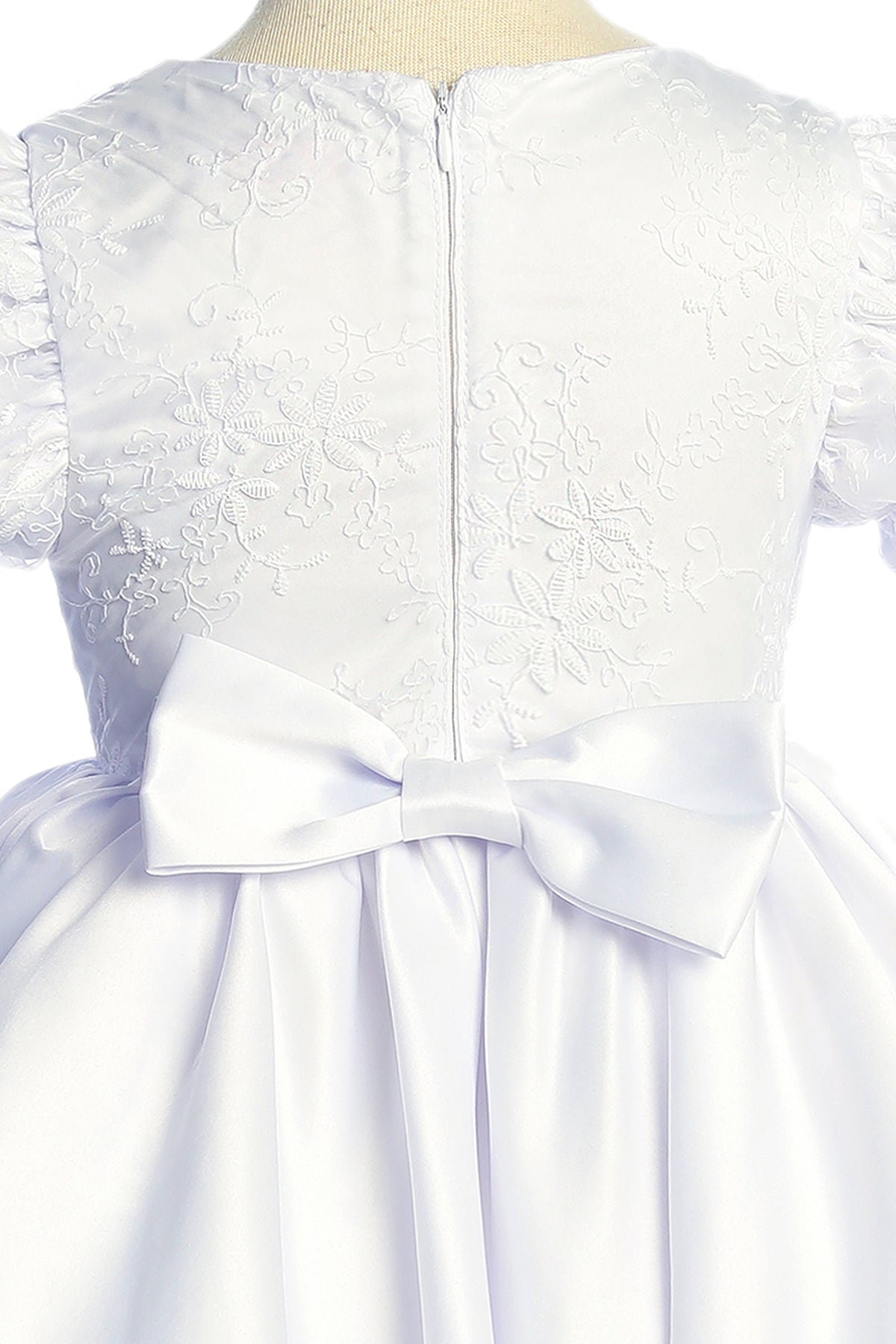White satin babydoll dress with embroidered details, puff sleeves, and plus size options from Kid's Dream for girls.