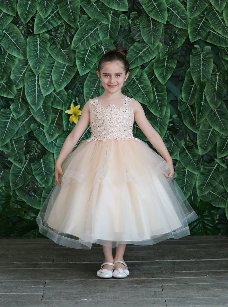 Calla Collection D-792 children's pageant dress with a beautiful sheer illusion scoop neckline