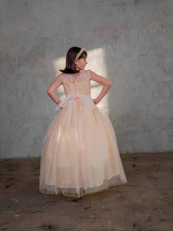 Symmetrical frontal view of the Calla Collection D-816 dress highlighting the refined neckline and floral trims.