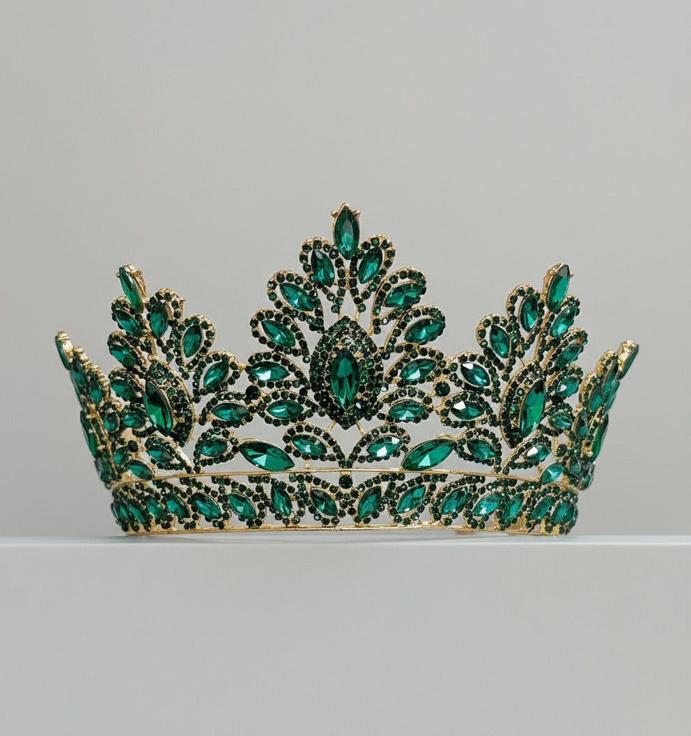 Calla Collection TR-937 gold jewelry featuring an elegant emerald gemstone with intricate design details.