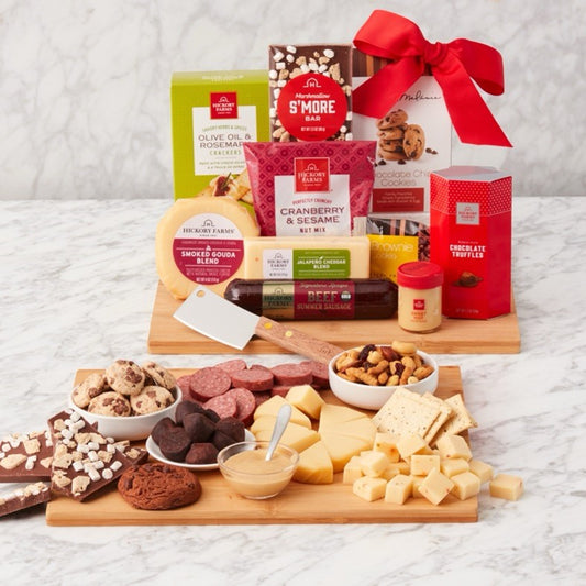 Holiday gift basket featuring a cutting board from GreatArrivals/WineCountry, perfect for seasonal celebrations and gift-giving.