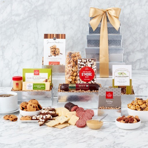 Gourmet gift basket with shimmering wrapping from GreatArrivals/WineCountry, filled with assorted treats and elegant packaging.