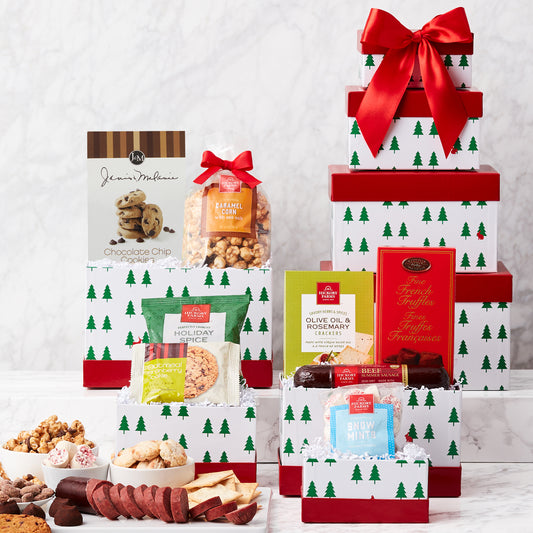 Holiday gift basket from GreatArrivals/WineCountry featuring festive treats and decorations in a colorful gift tower.