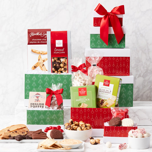 Holiday gift basket from GreatArrivals/WineCountry featuring a festive assortment of gourmet treats and wines in a decorative tower.