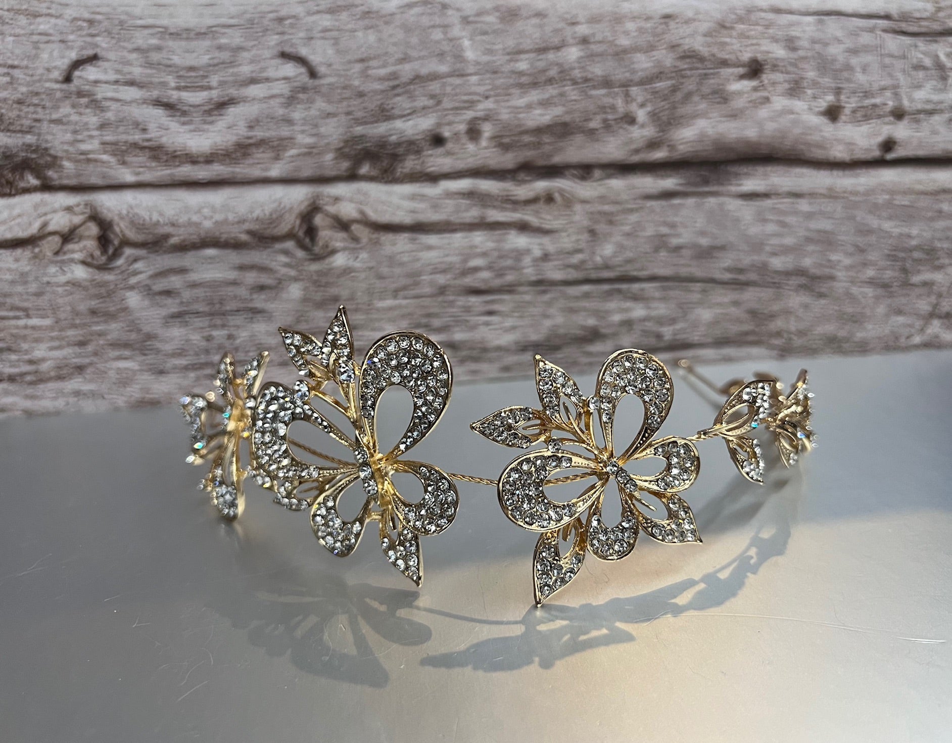 Calla Collection TR-630 gold jewelry piece featuring intricate design and polished finish, close-up view of the elegant accessory.