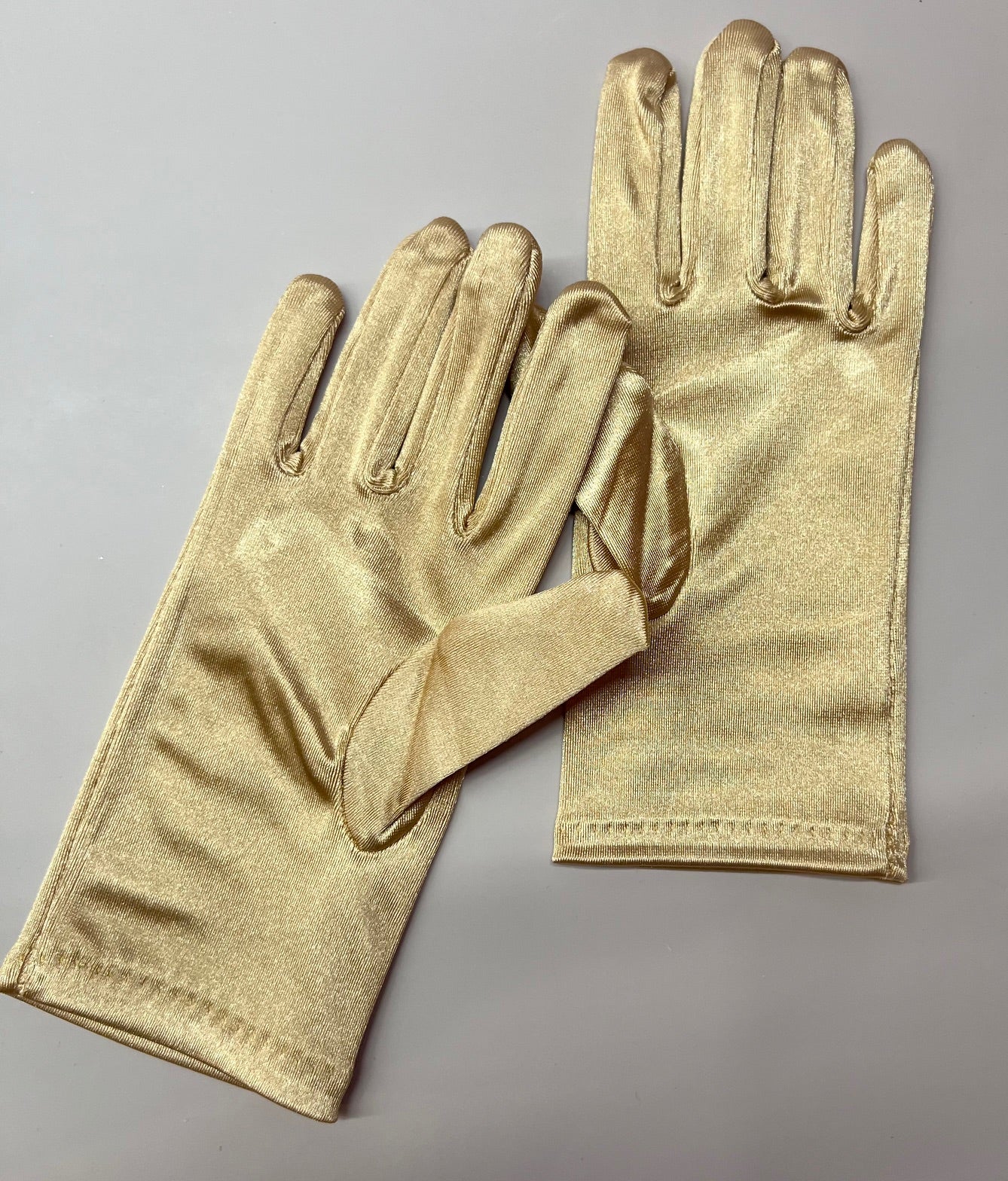 Calla Collection kids gloves in gold, featuring soft material and snug fit, perfect for children's winter wear.
