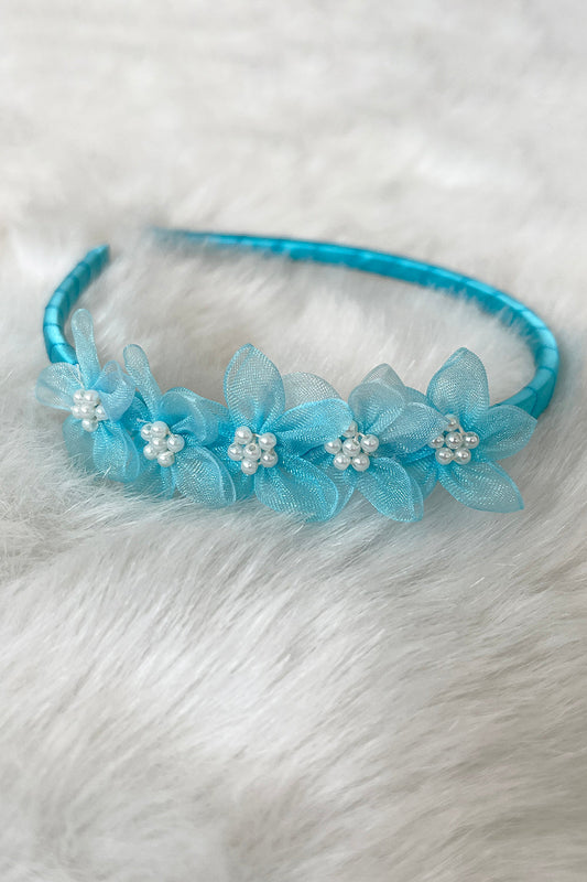 Aqua organza flower headband with pearl detailing for kids, featuring delicate fabric flowers and elegant pearl accents.
