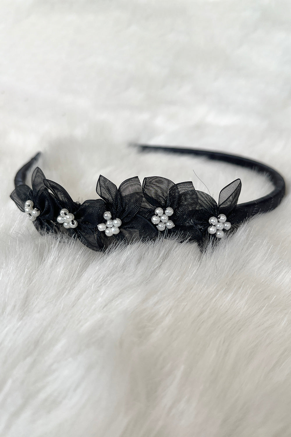 Black organza flower headband with pearl accents, stylish accessories for children by Kid's Dream.