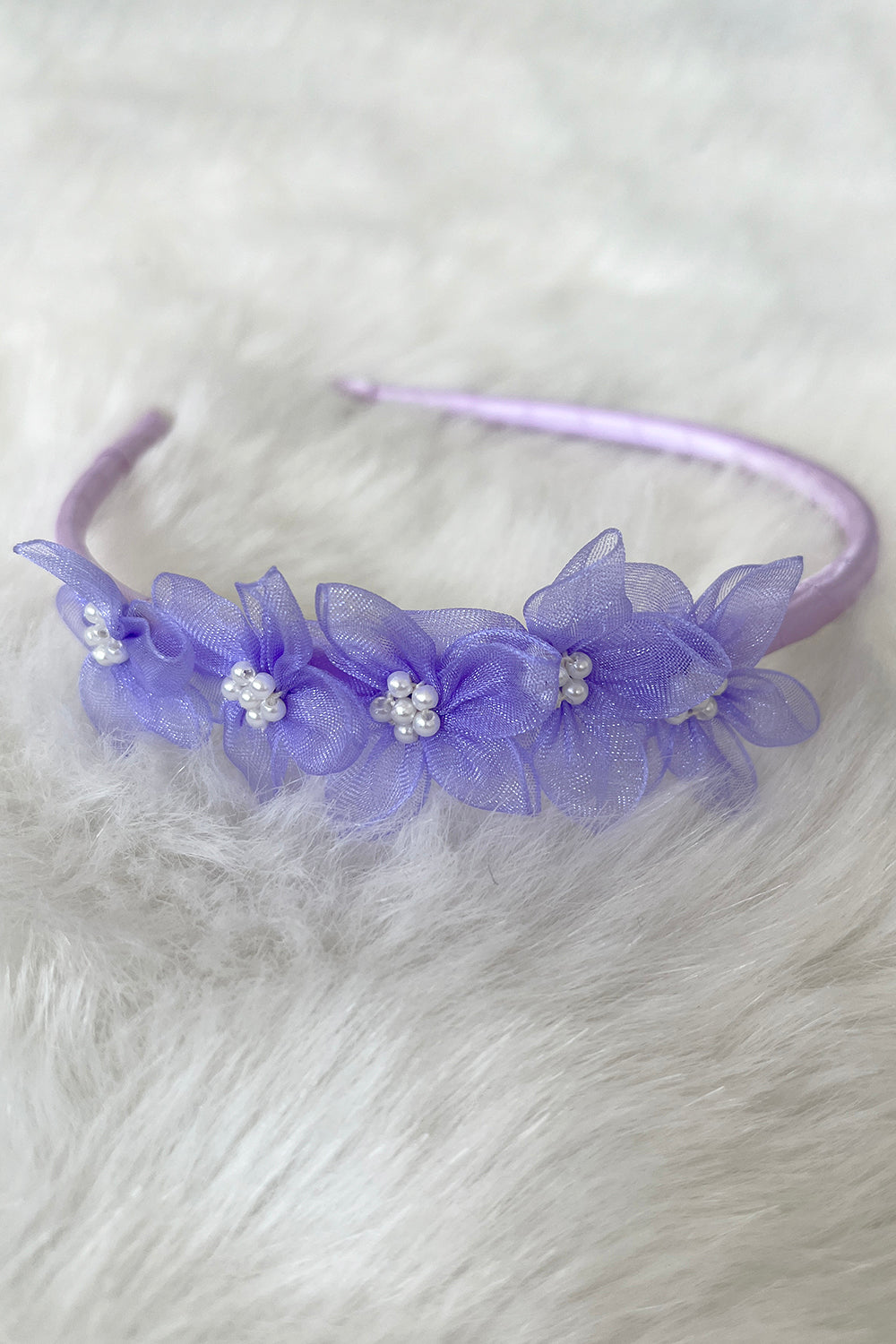 Lilac organza flower headband with pearl detailing, accessory by Kid's Dream, perfect for special occasions or dress-up.