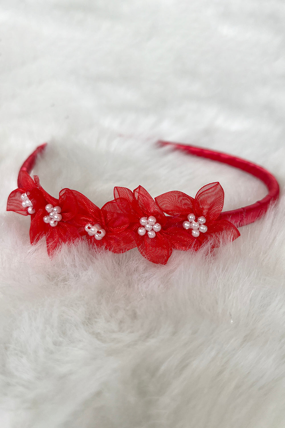 Red organza flower headband with pearl accents, stylish accessory for kids by Kid's Dream, featuring elegant floral design.