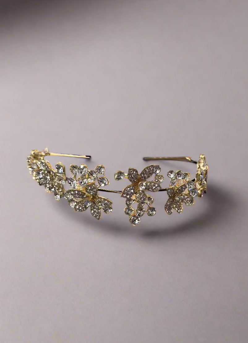 Calla Collection TR-635 jewelry piece featuring intricate design and shiny metal finish, showcasing detailed craftsmanship.