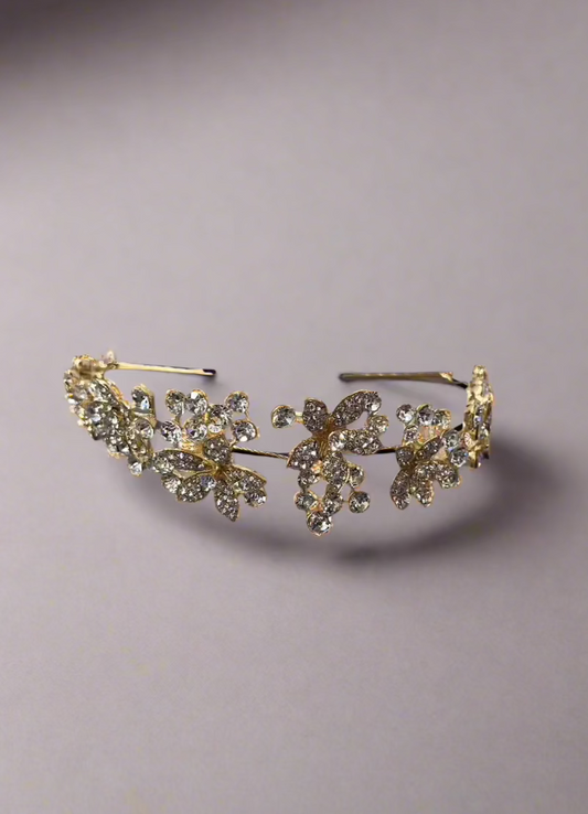 CallaCollection TR-635 jewelry piece featuring intricate design and shiny metal finish, showcasing detailed craftsmanship.