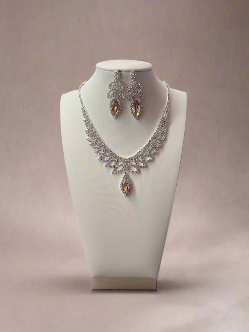 Calla Collection necklace featuring a delicate chain and elegant pendant, displayed on a neutral background.