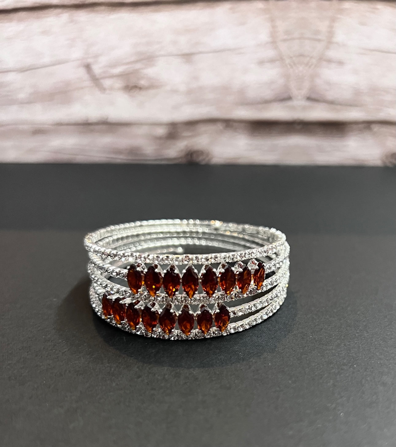 Versatile Calla Collection multi-layer fashion bracelet with mixed metal strands and elegant design, displayed on a neutral background.