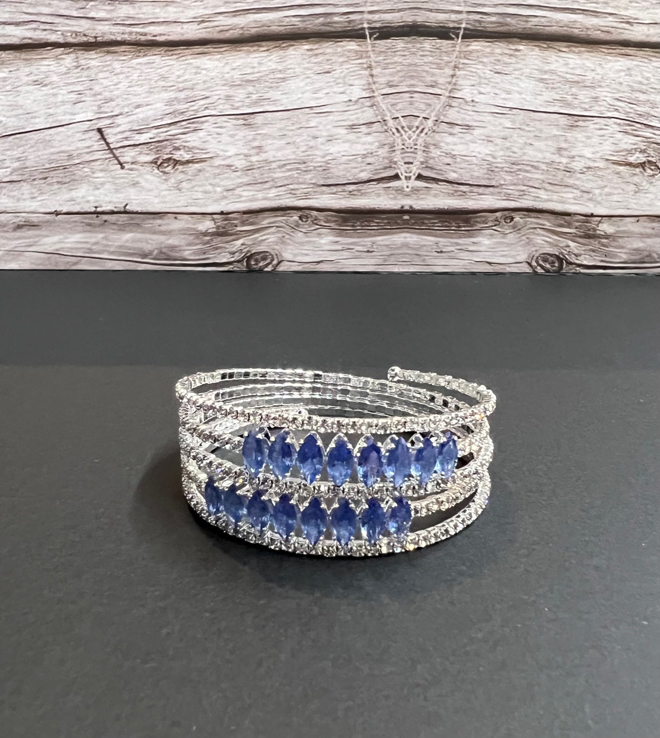 Versatile multi-layer fashion bracelet from Calla Collection, featuring stylish mixed jewelry elements and intricate design details.