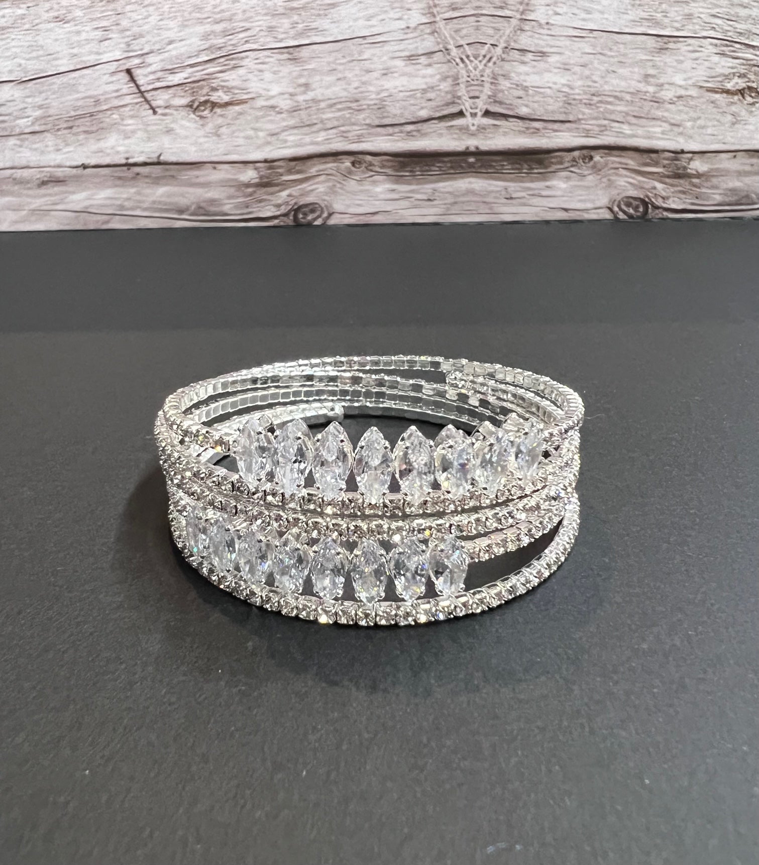 Versatile multi-layer fashion bracelet from CALLAcollection3 with intricate metal designs and diverse chain styles.