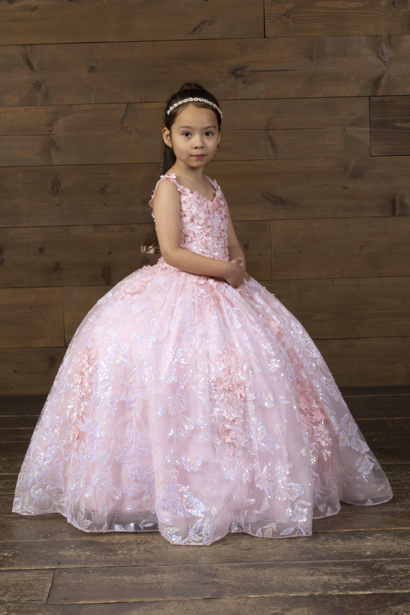 Magnificent full-length ball gown skirt dropping into a wide sweeping, high-volume princess silhouette on the Calla Collection SCK-323 dress.