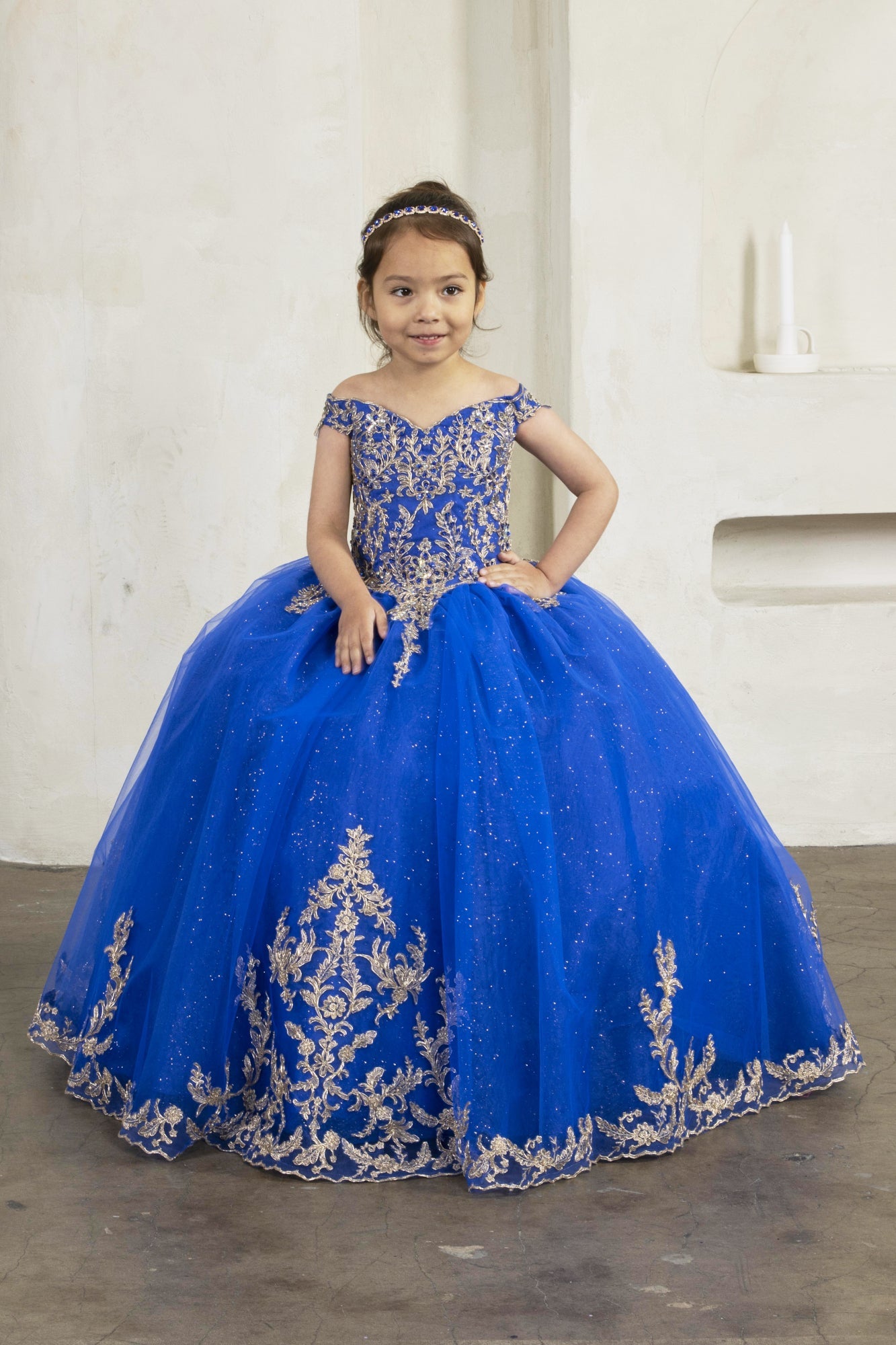 Calla Collection SCK-318 girls special occasion gown showcasing a romantic off-the-shoulder neckline and tailored bodice.